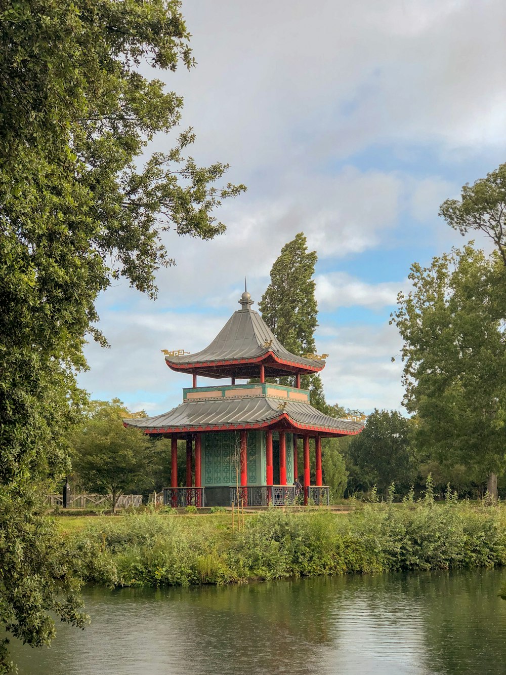 wooden structure beside body of water