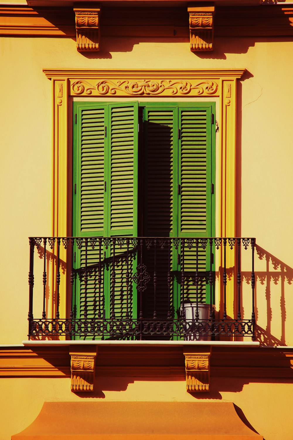 opened green wooden terrace door