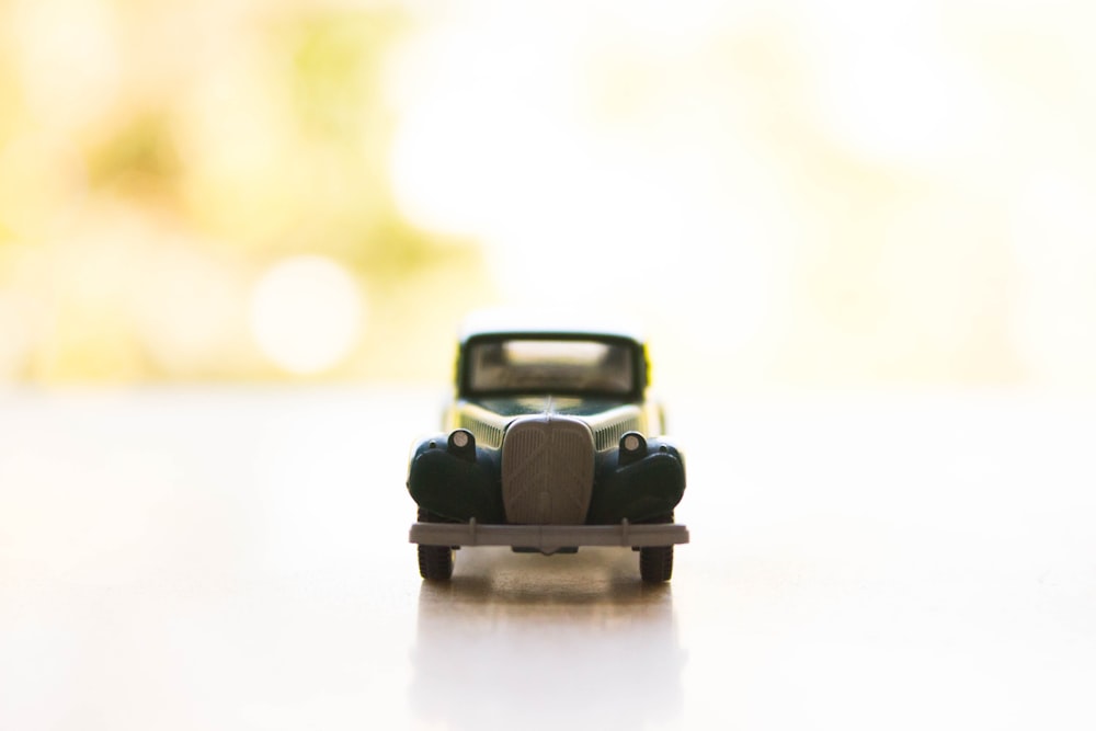 black die-cast toy car macro photography