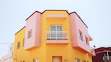 yellow and pink building