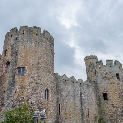 gray concrete castle under cloudy sky