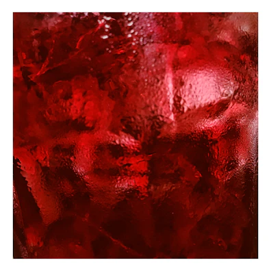 Close-up of a high-quality acrylic print texture with light reflections.