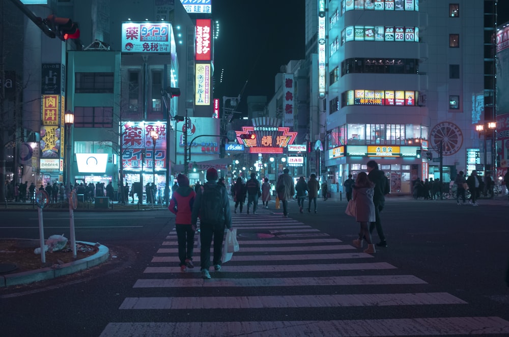 people crossing pedestrian lane