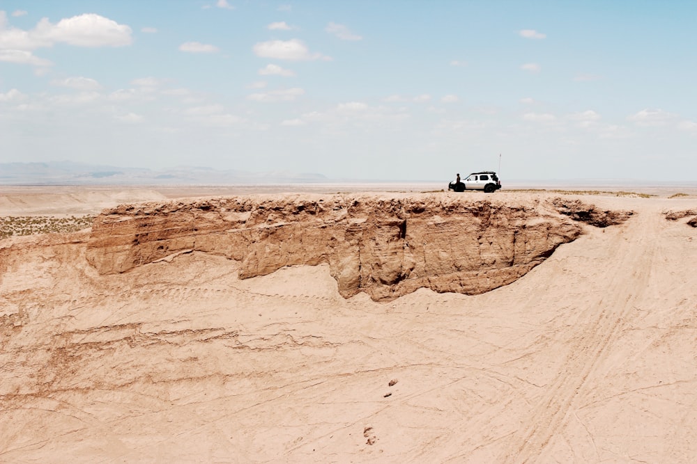 car parked on rocky mountain