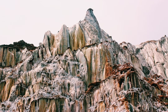 rocky mountain during day in Hormuz Island Iran