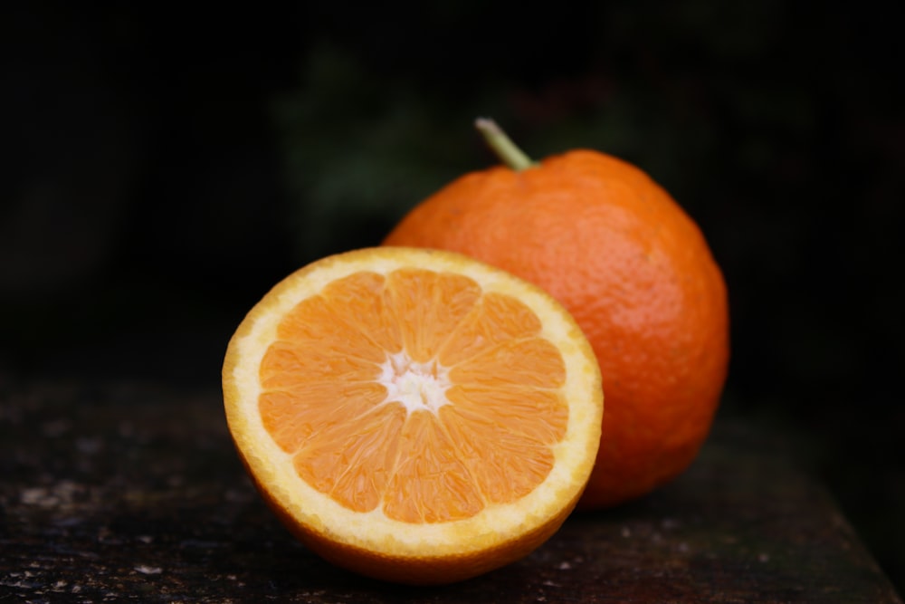 selective focus photography of orange fruit