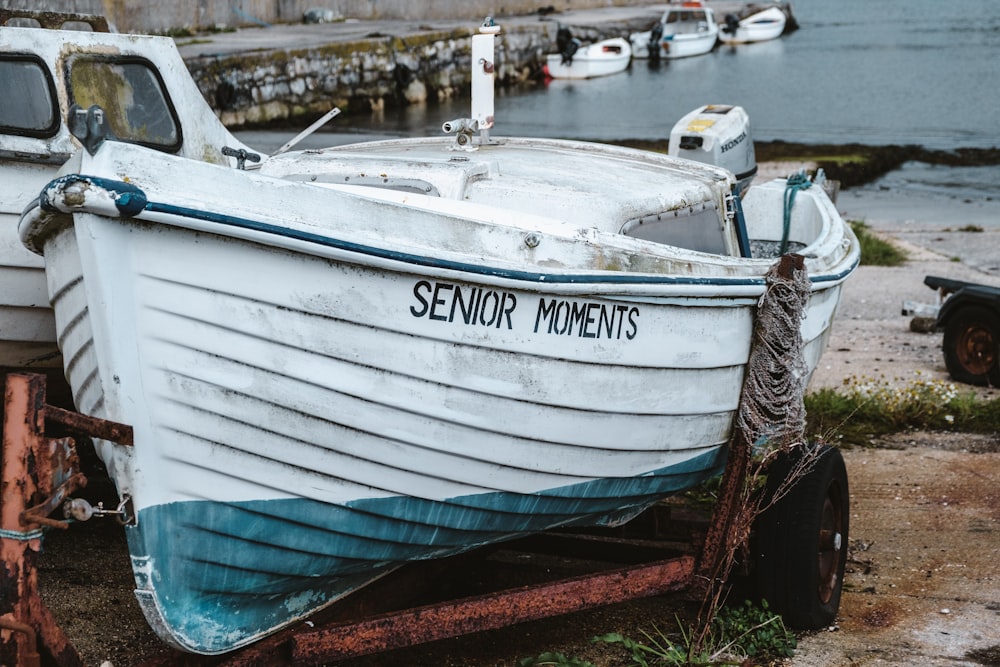 white wooden boat