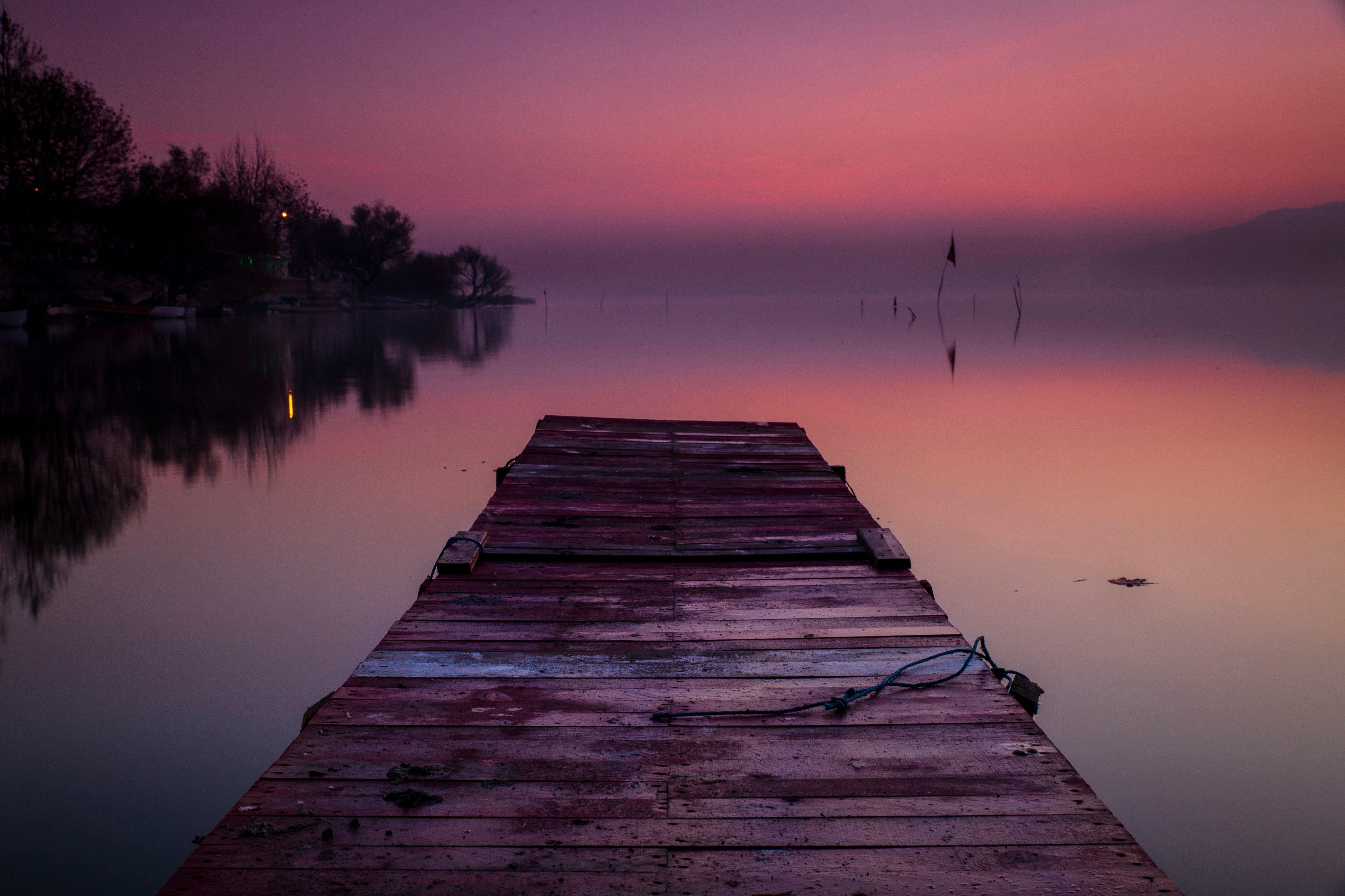 wooden dock during golden hour