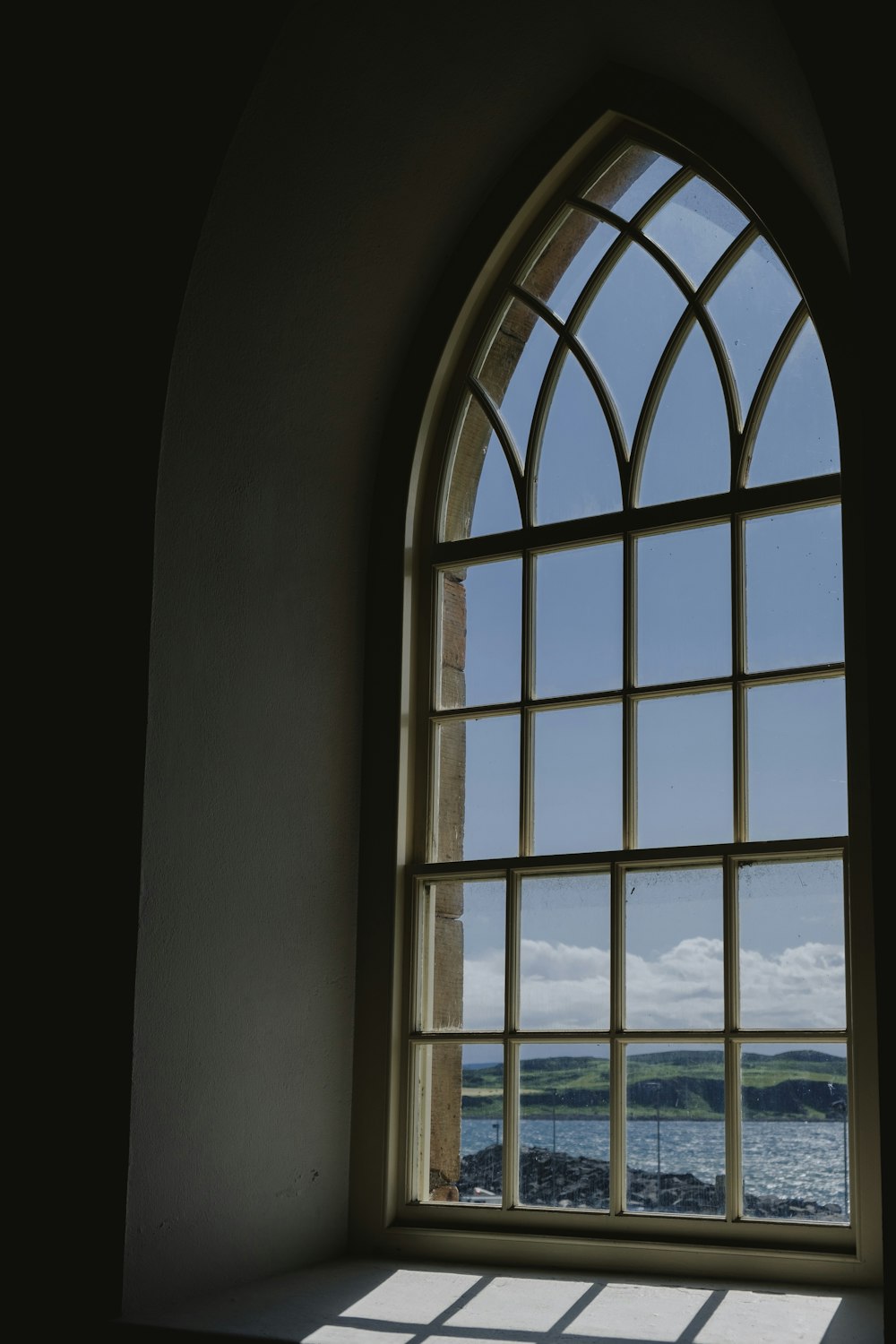 closed white metal framed glass window