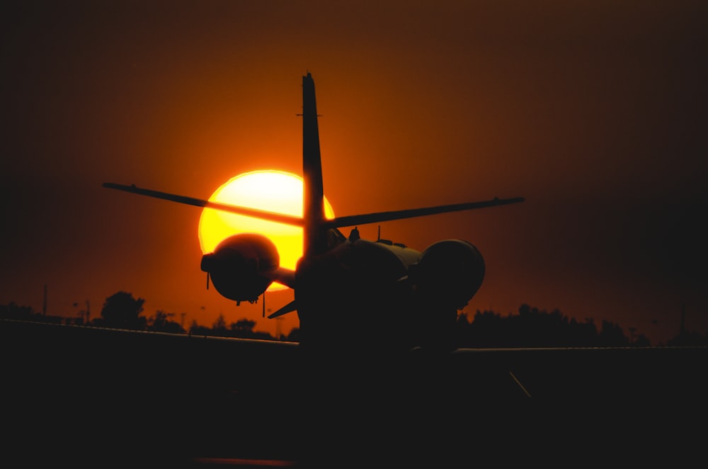 silhouette photo of plane