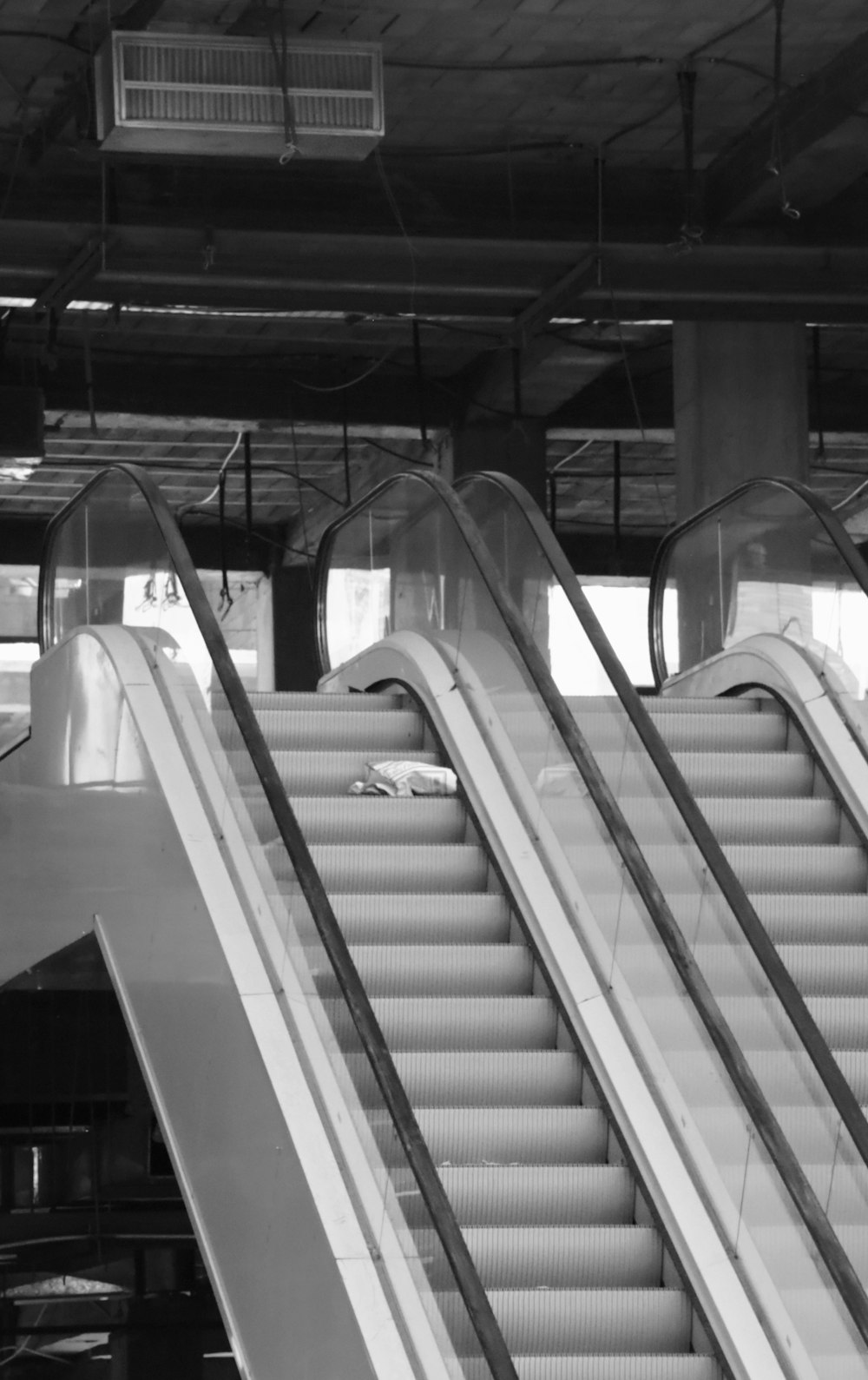white and gray escalator