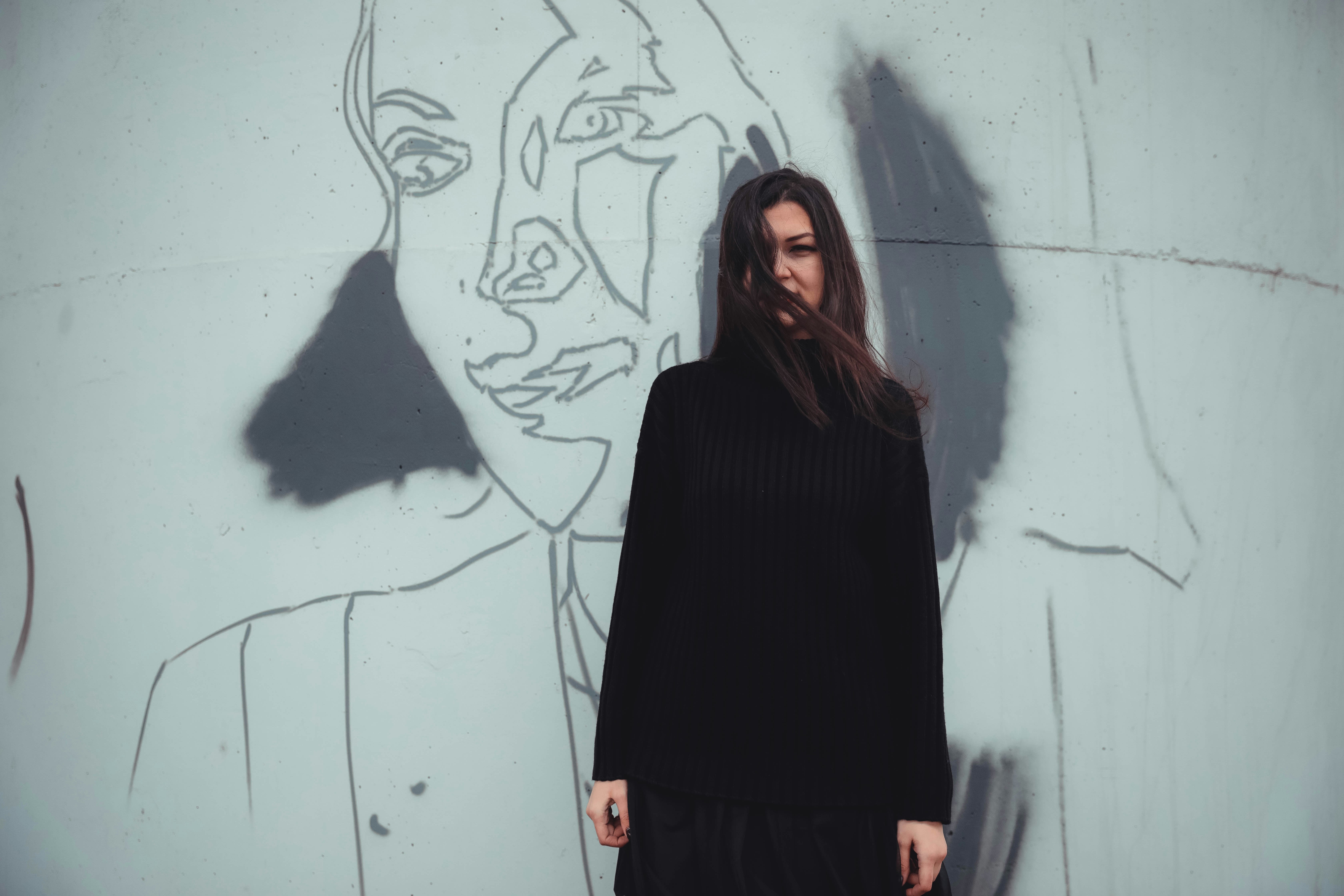 woman in black long-sleeved shirt