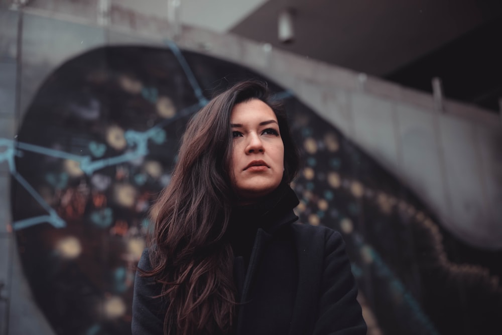 woman wearing black coat