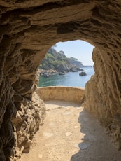 sunlight on cave's mouth during daytime