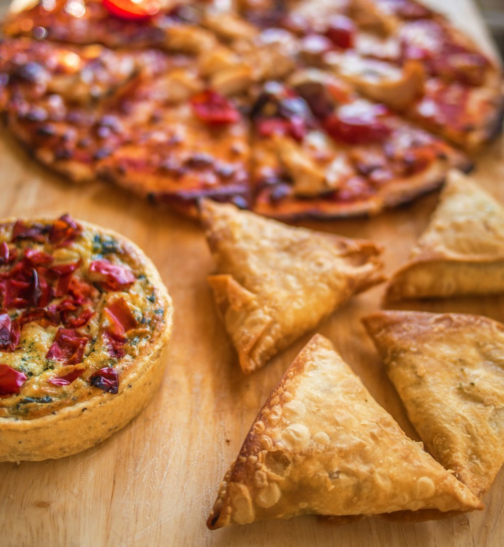 sliced pizza near pastries