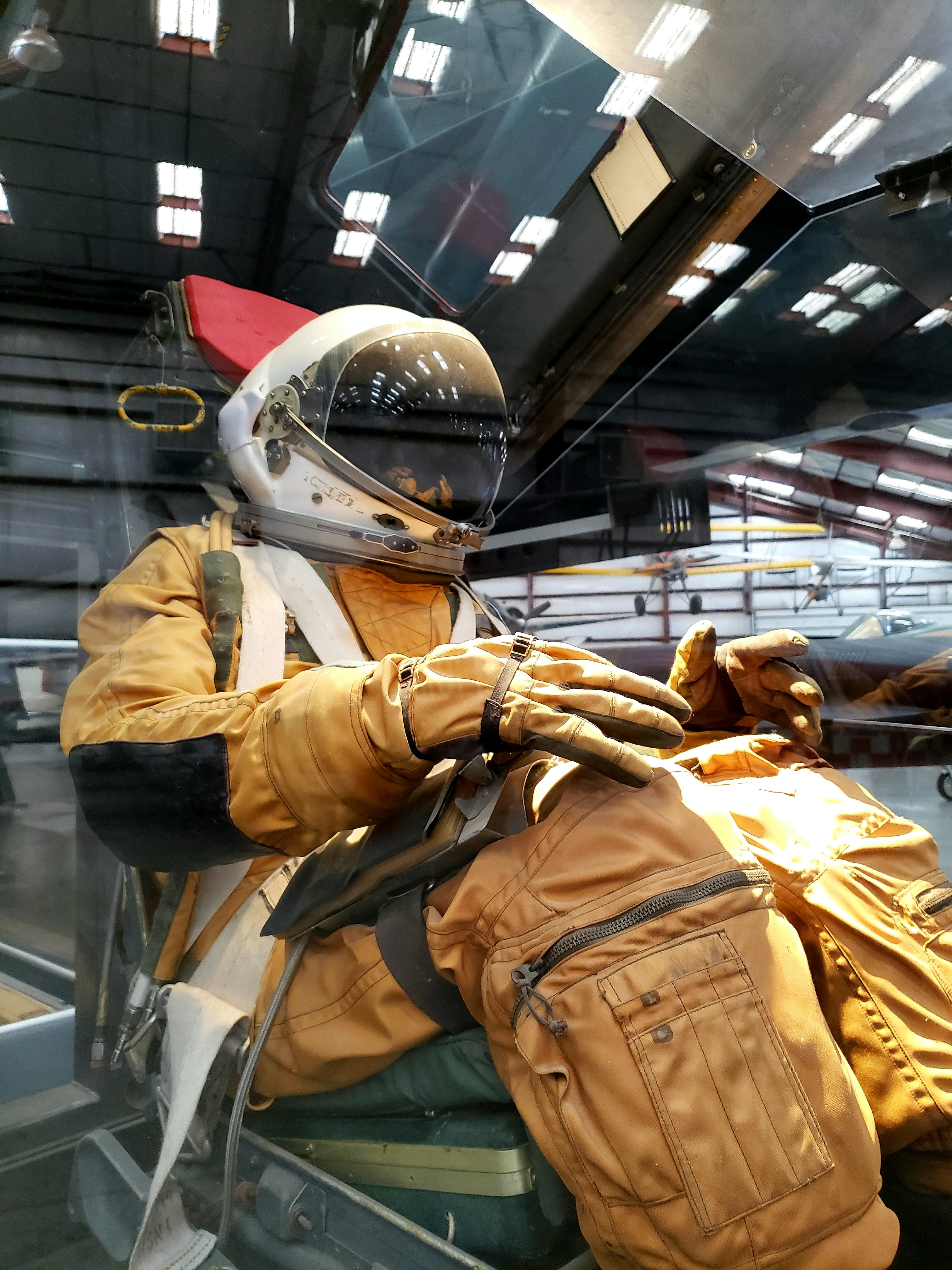 person wearing brown spacesuit