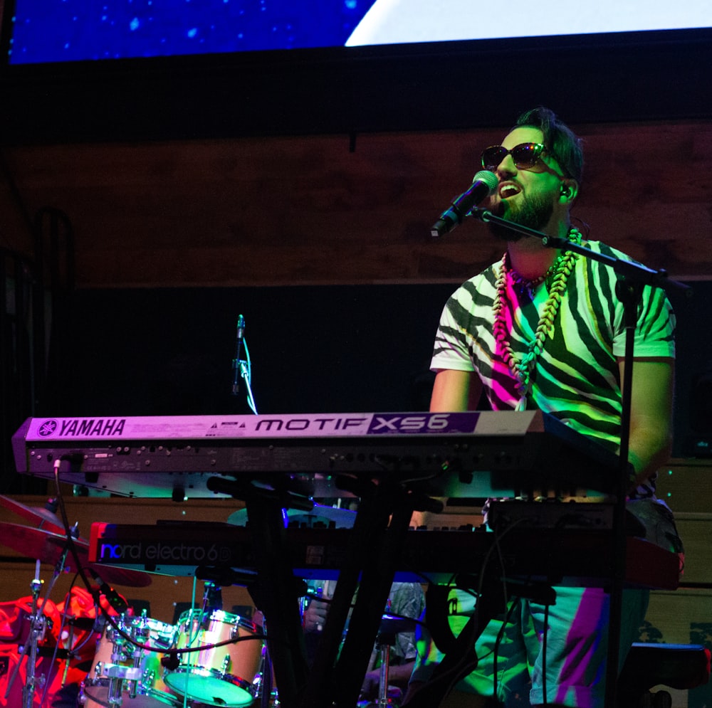 man singing using microphone