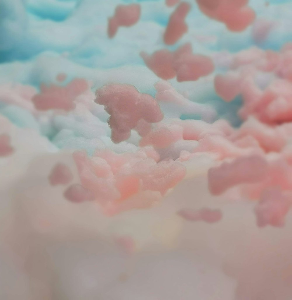 a close up of a pink and blue substance