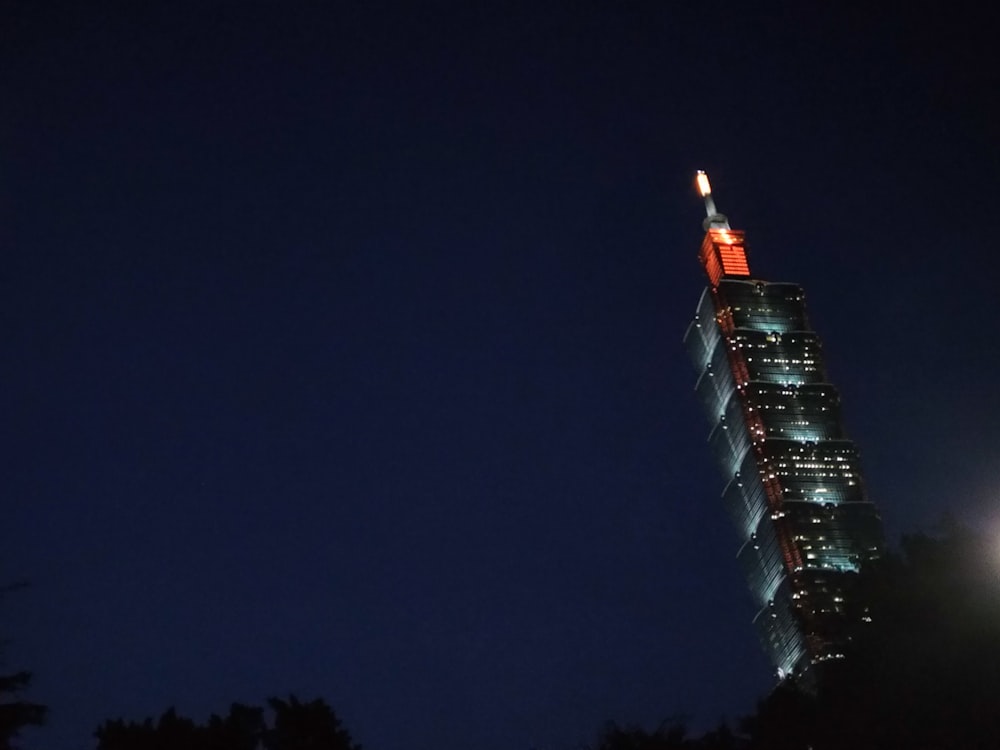 black and red building during night