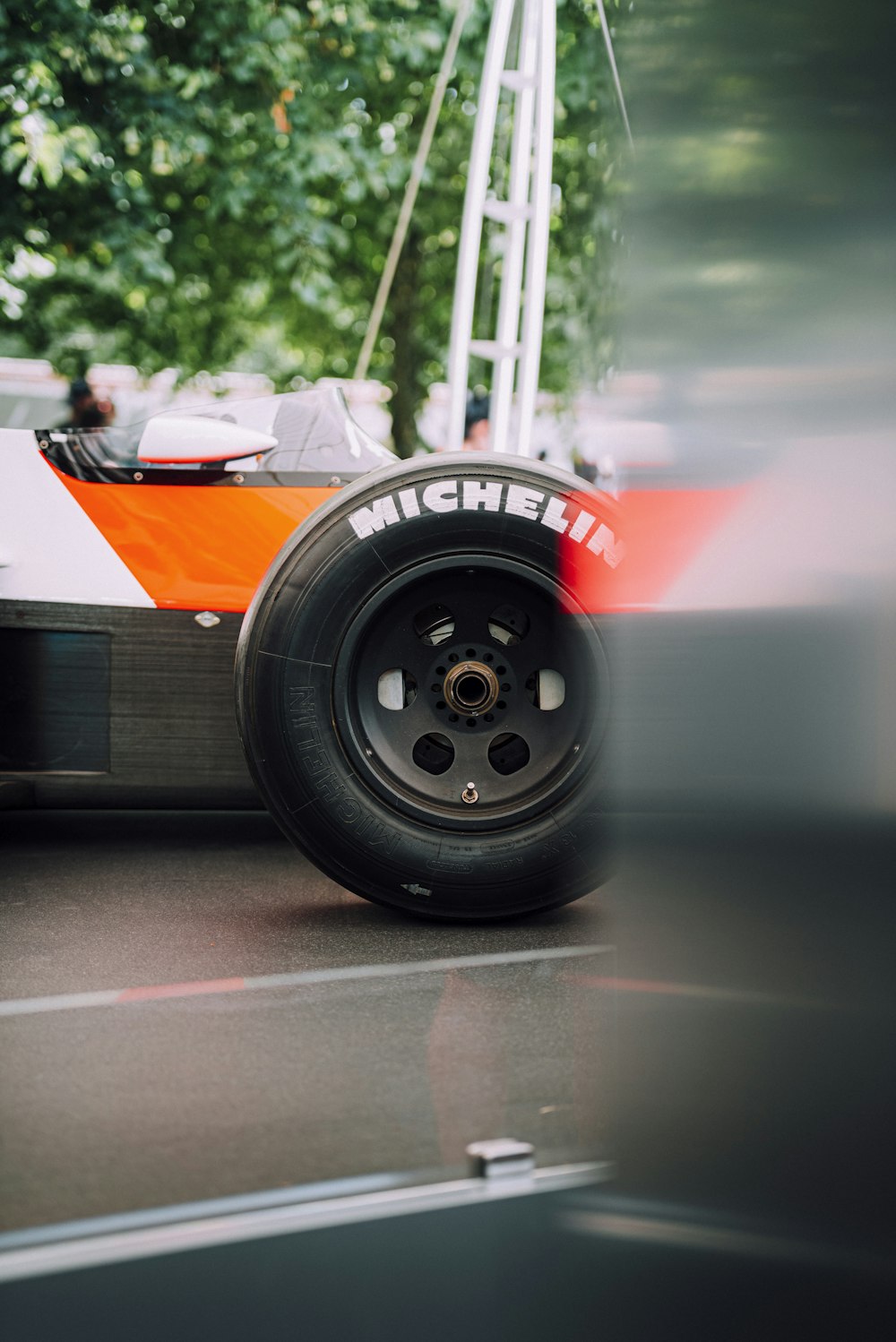 selective photo of vehicle wheel with Michelin tire