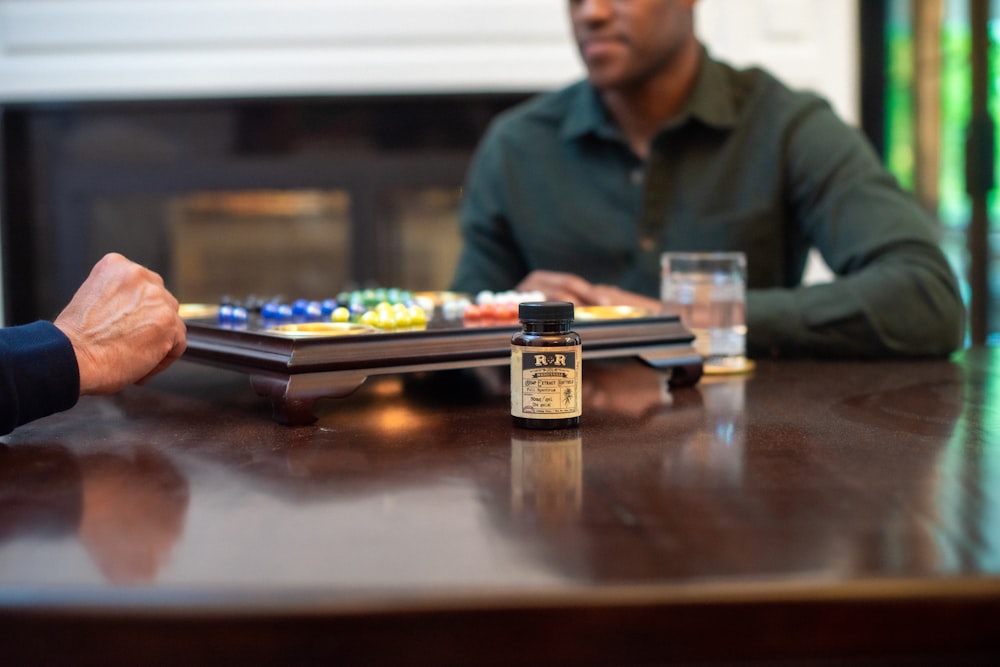 selective photo of labeled bottle on table