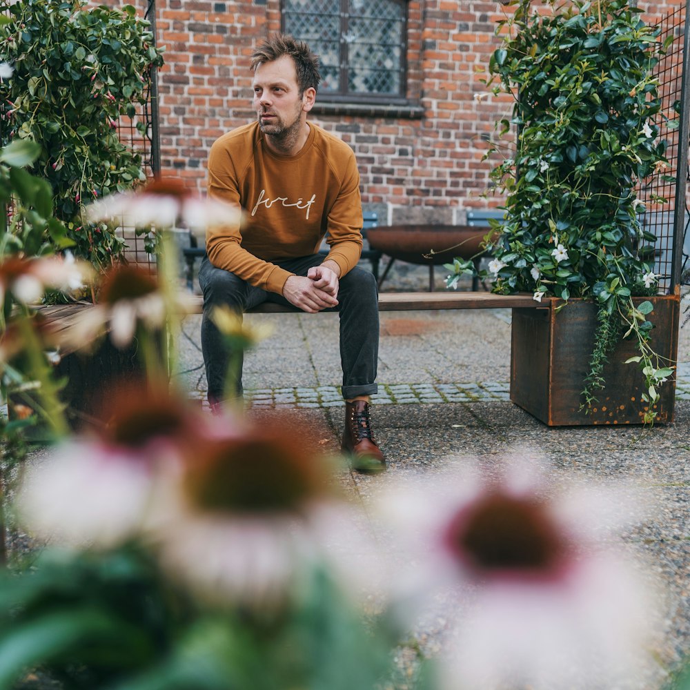 man sitting on bench