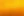 a yellow wall with a clock on it