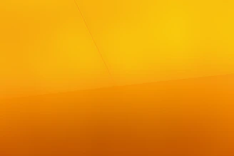 a yellow wall with a clock on it