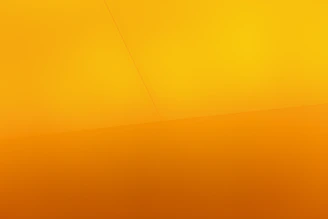 a yellow wall with a clock on it