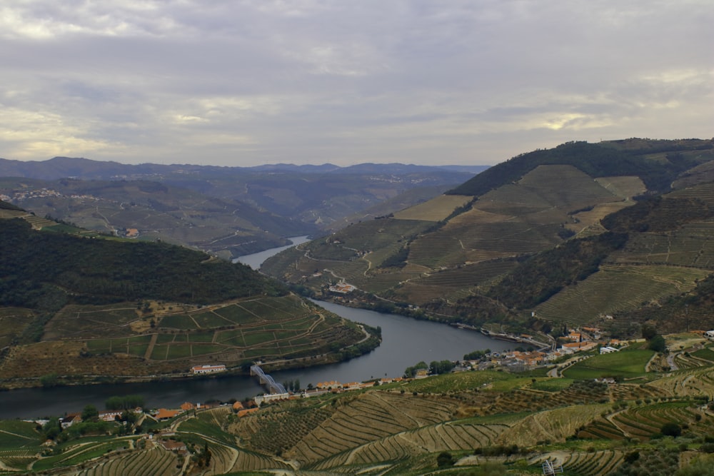 aerial photography of river between mountain