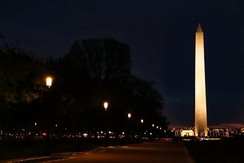 A nighttime view of the monument illuminated by soft lighting.