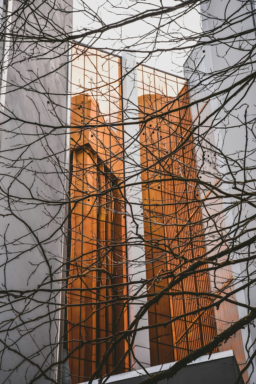 a tall building with a clock on the side of it