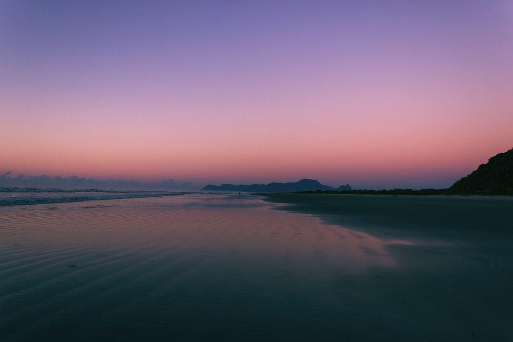 landscape photography of seashore during golden hour