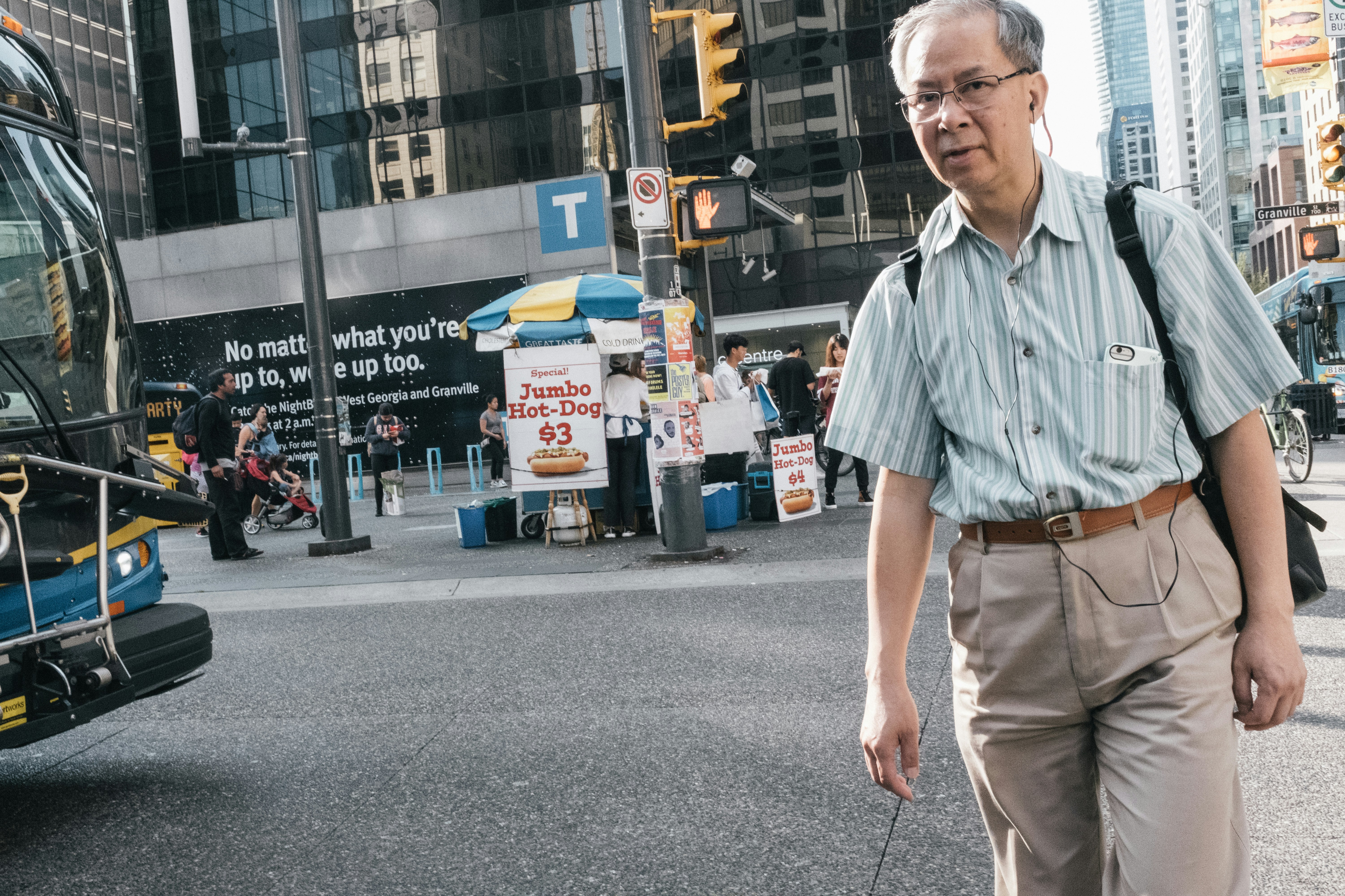 man wears blue stripe collared shirt