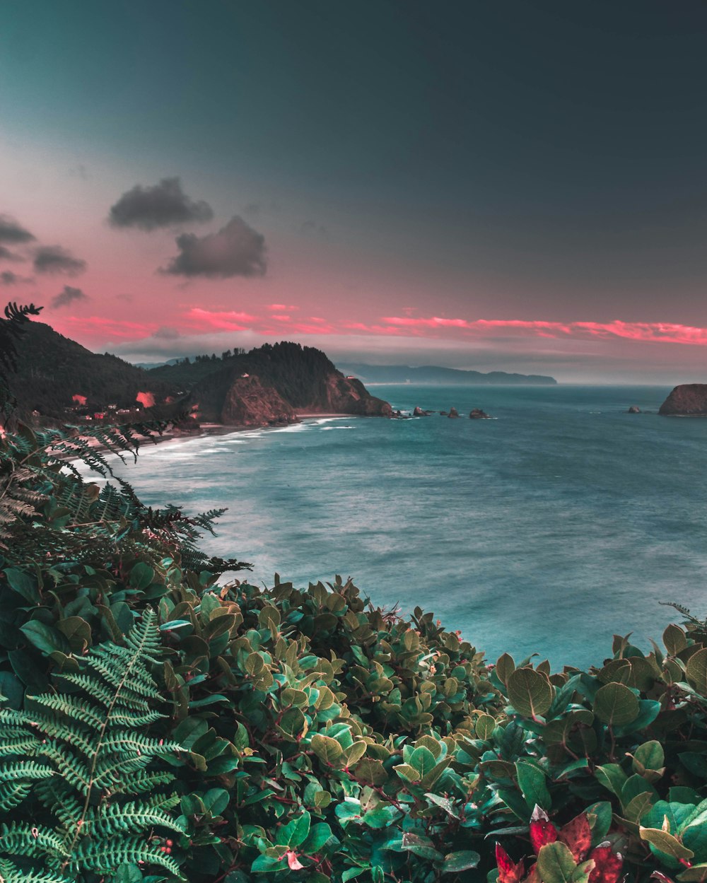 sea beside sleeping dinosaur island during golden hour