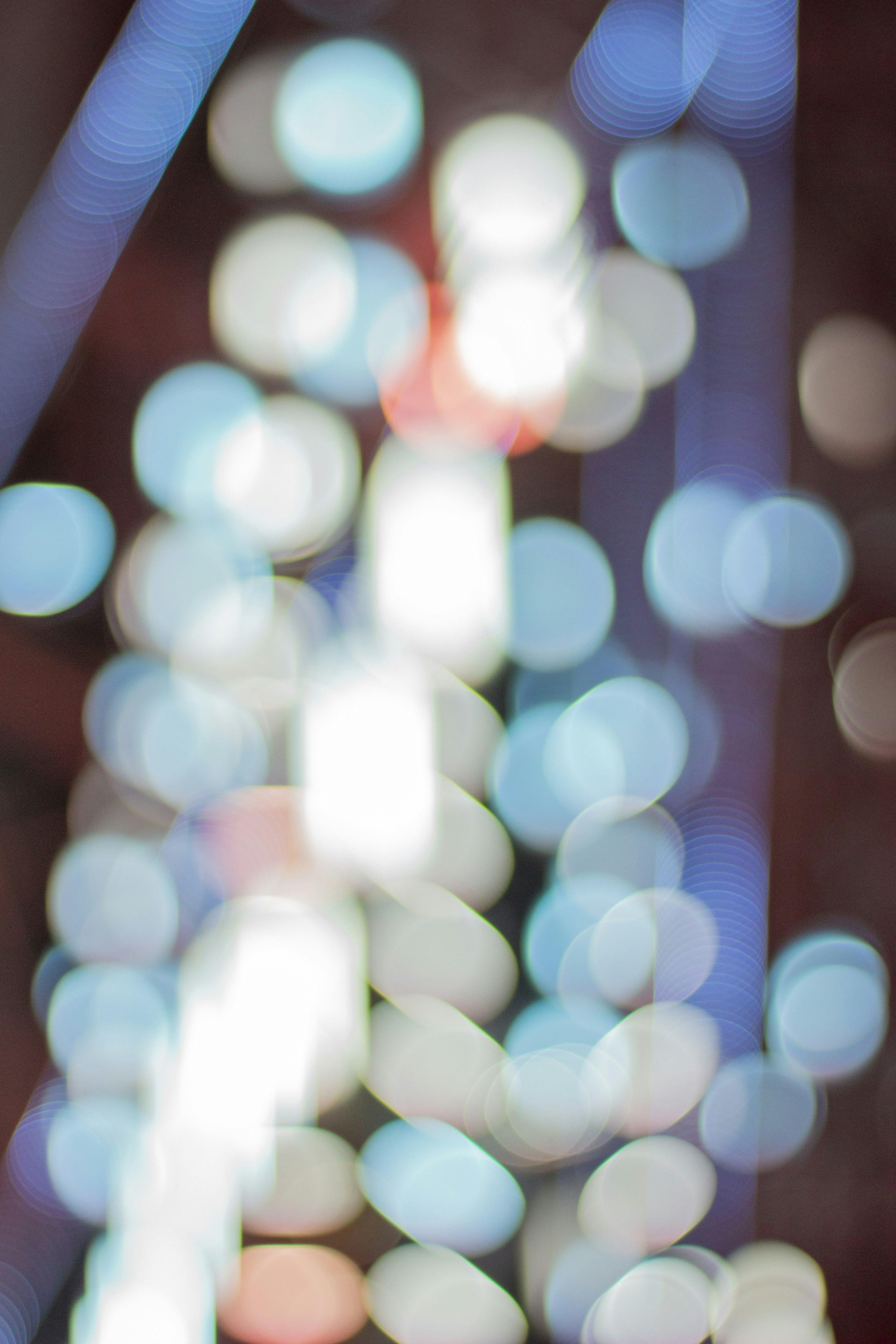 white and blue bokeh lights