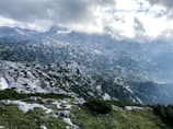 A panoramic view of Goizha Mountain’s rugged terrain under a dramatic sky.