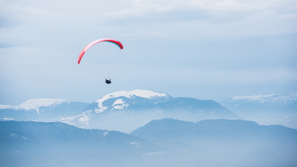 person paragliding during daytime