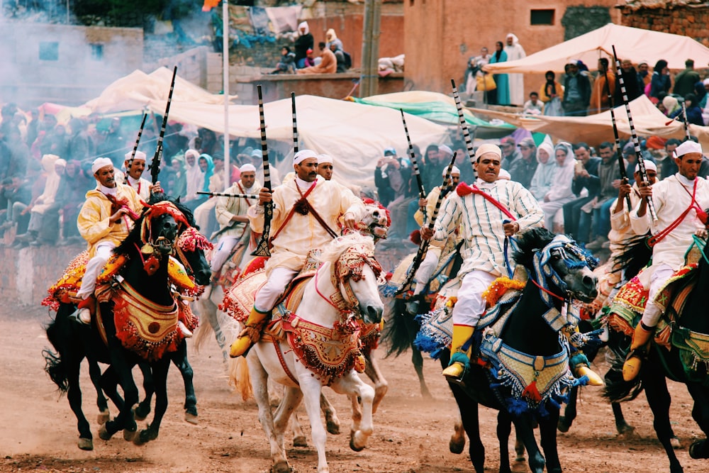 men riding horses