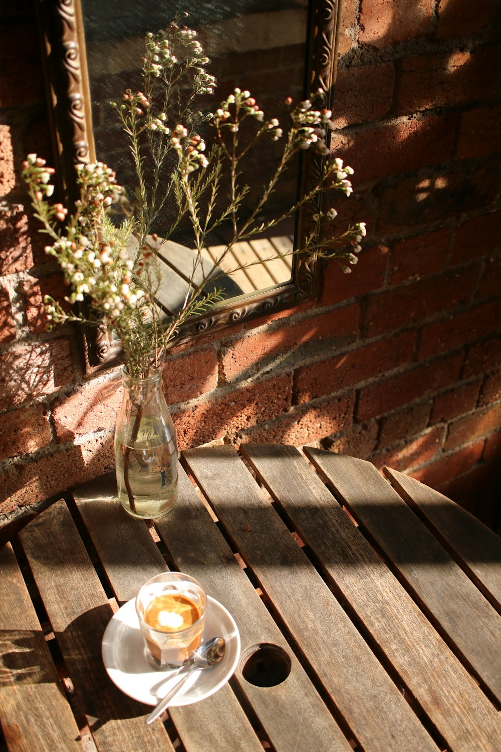 flower and coffee on table