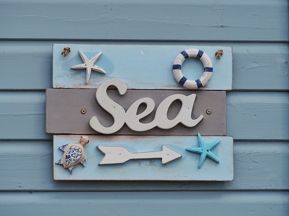 blue, white, and brown wooden board