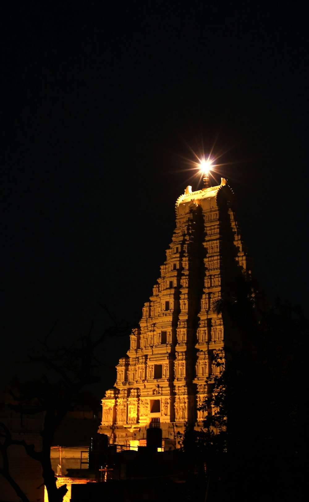 a very tall building lit up at night