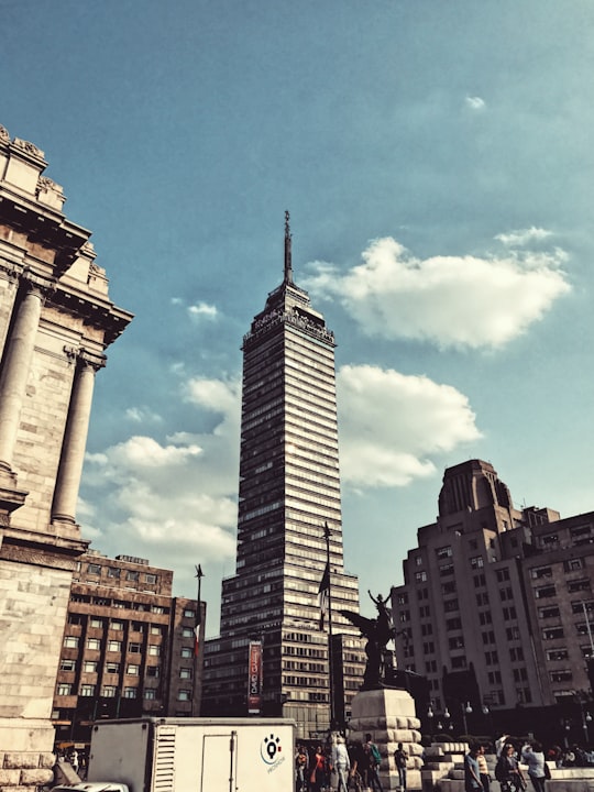 view of high rise building near monument in Palacio de Bellas Artes Mexico