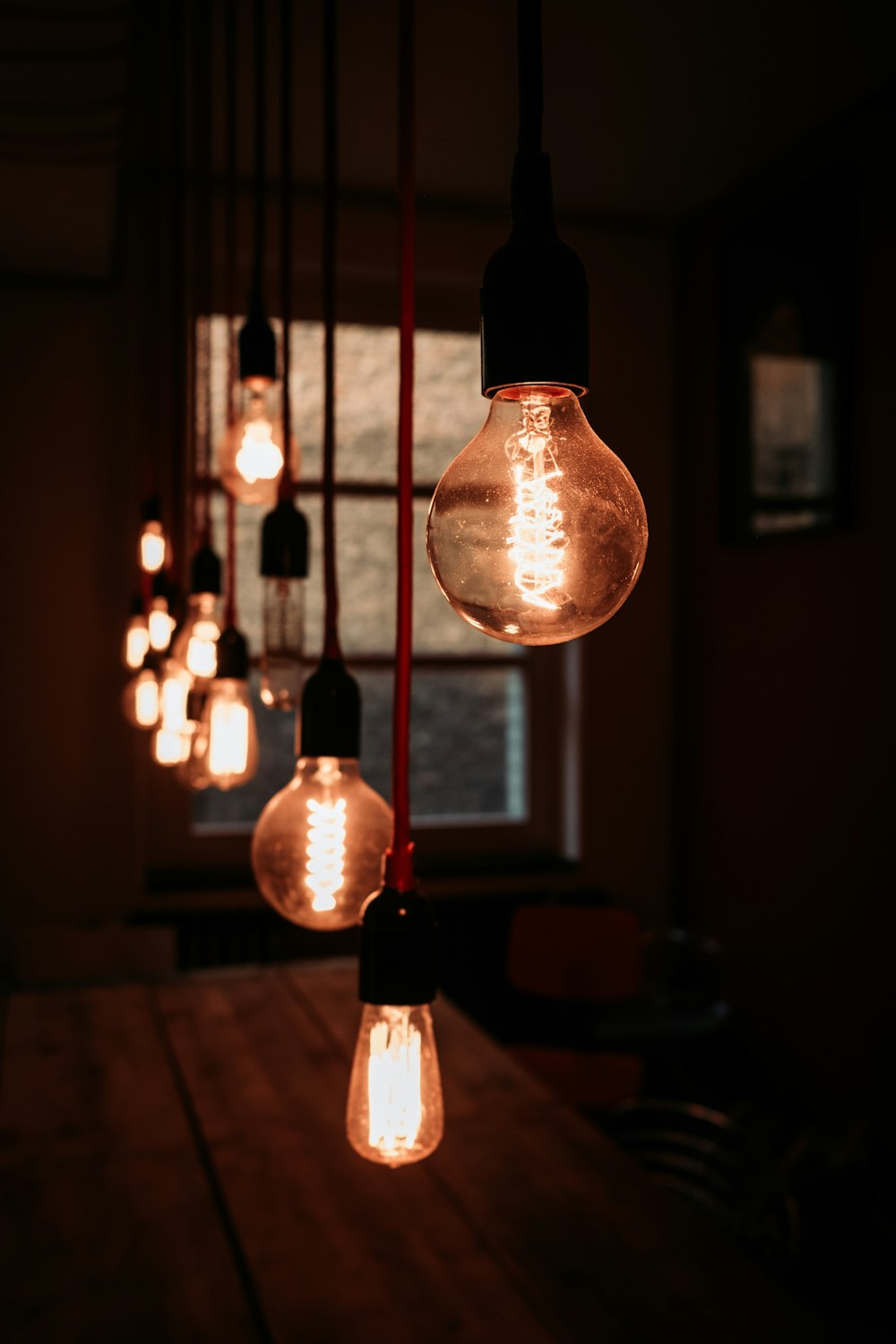 lighted orange pendant lamps