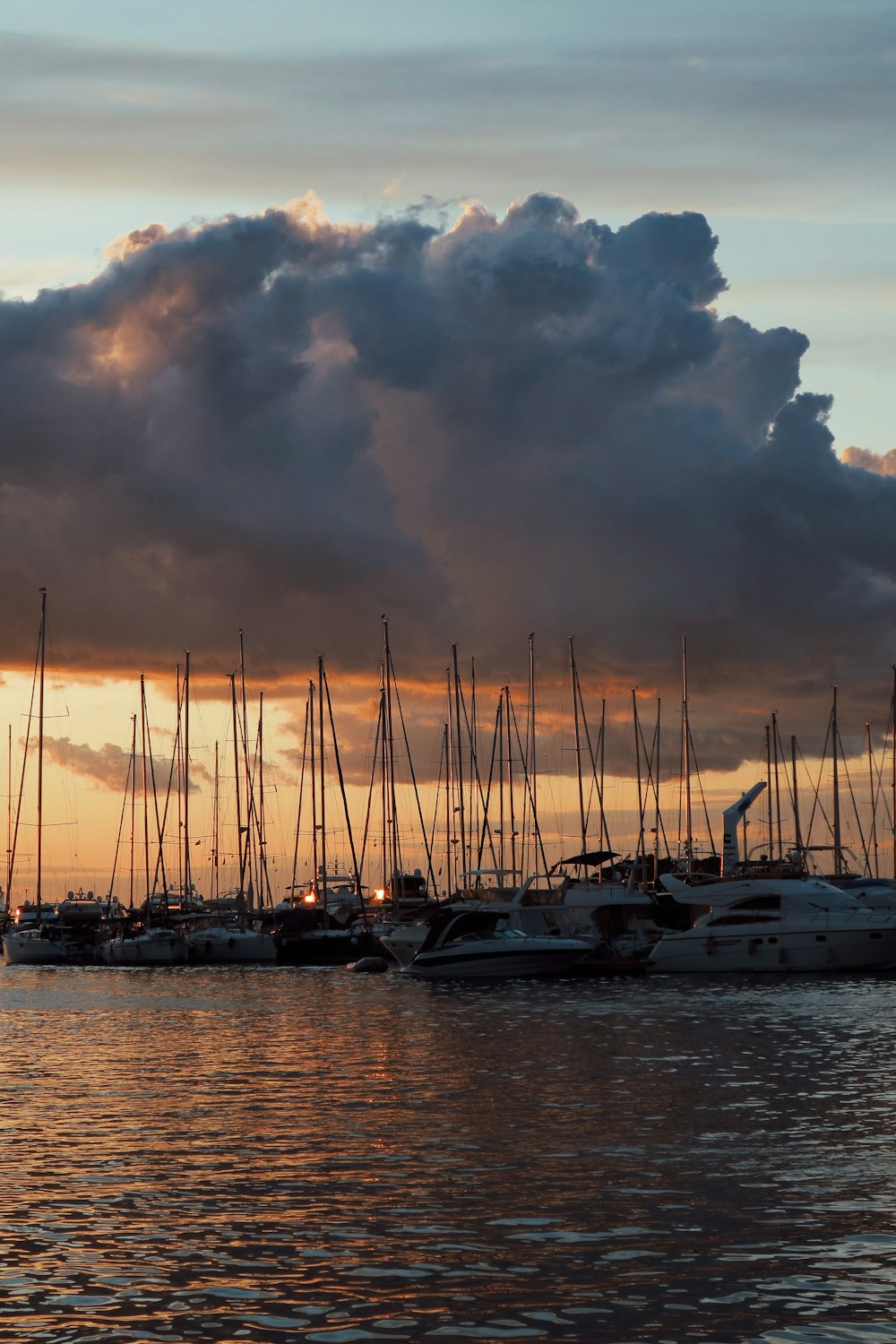 boats on calm body of water