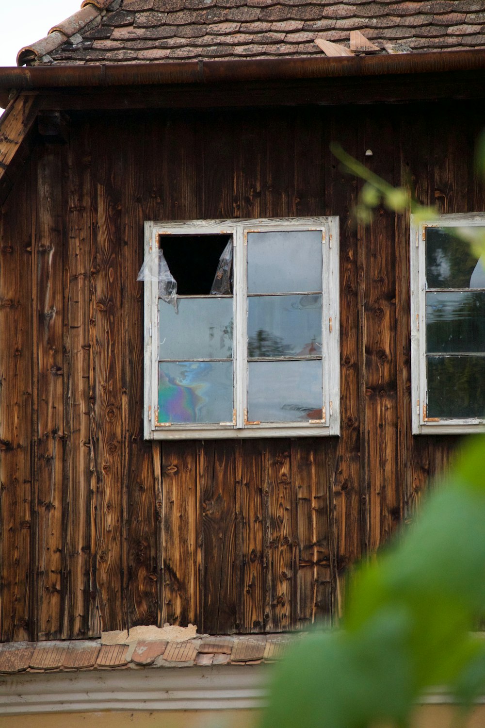 broken square white framed glass window