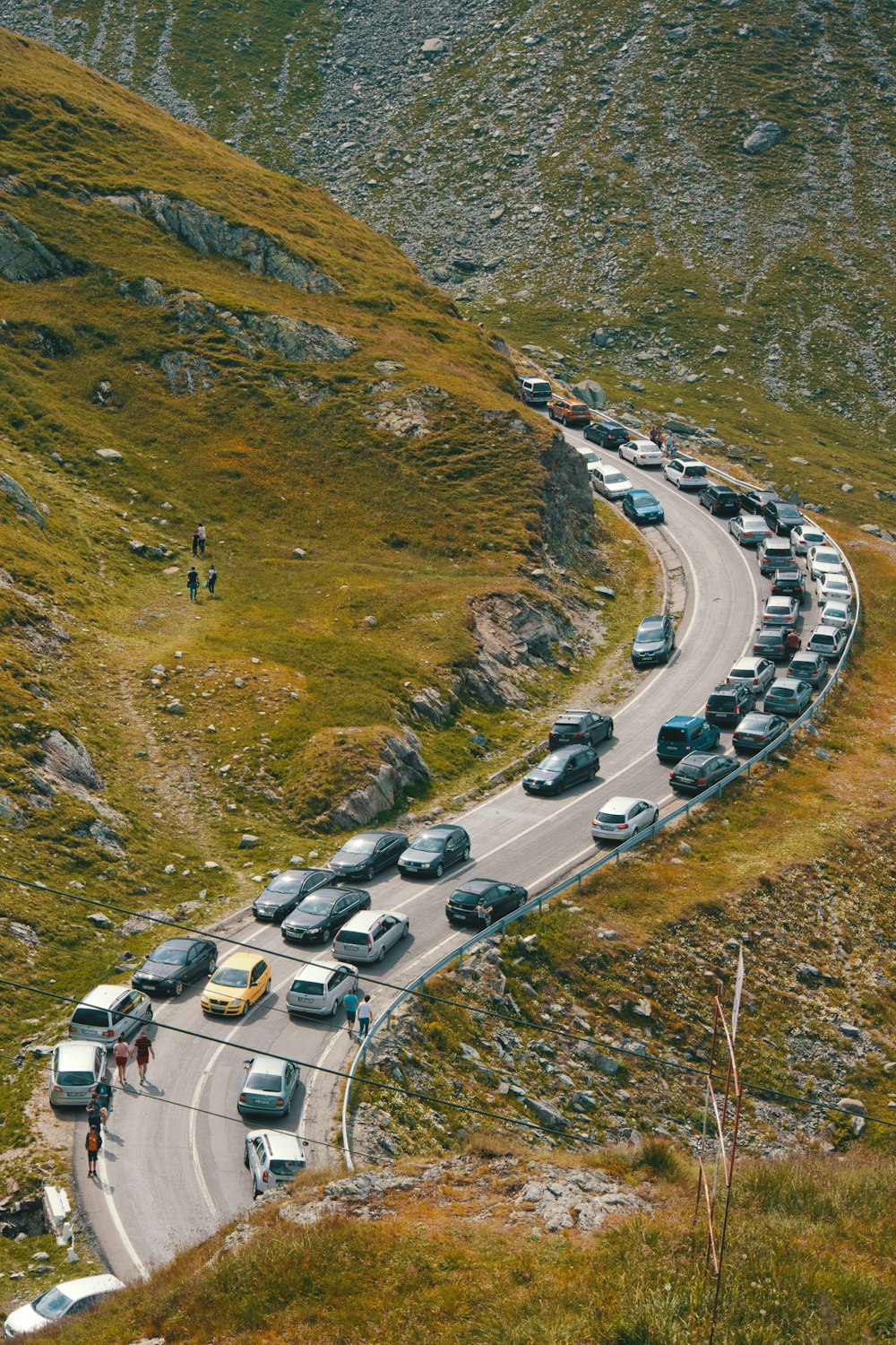 vehicles on road during daytime