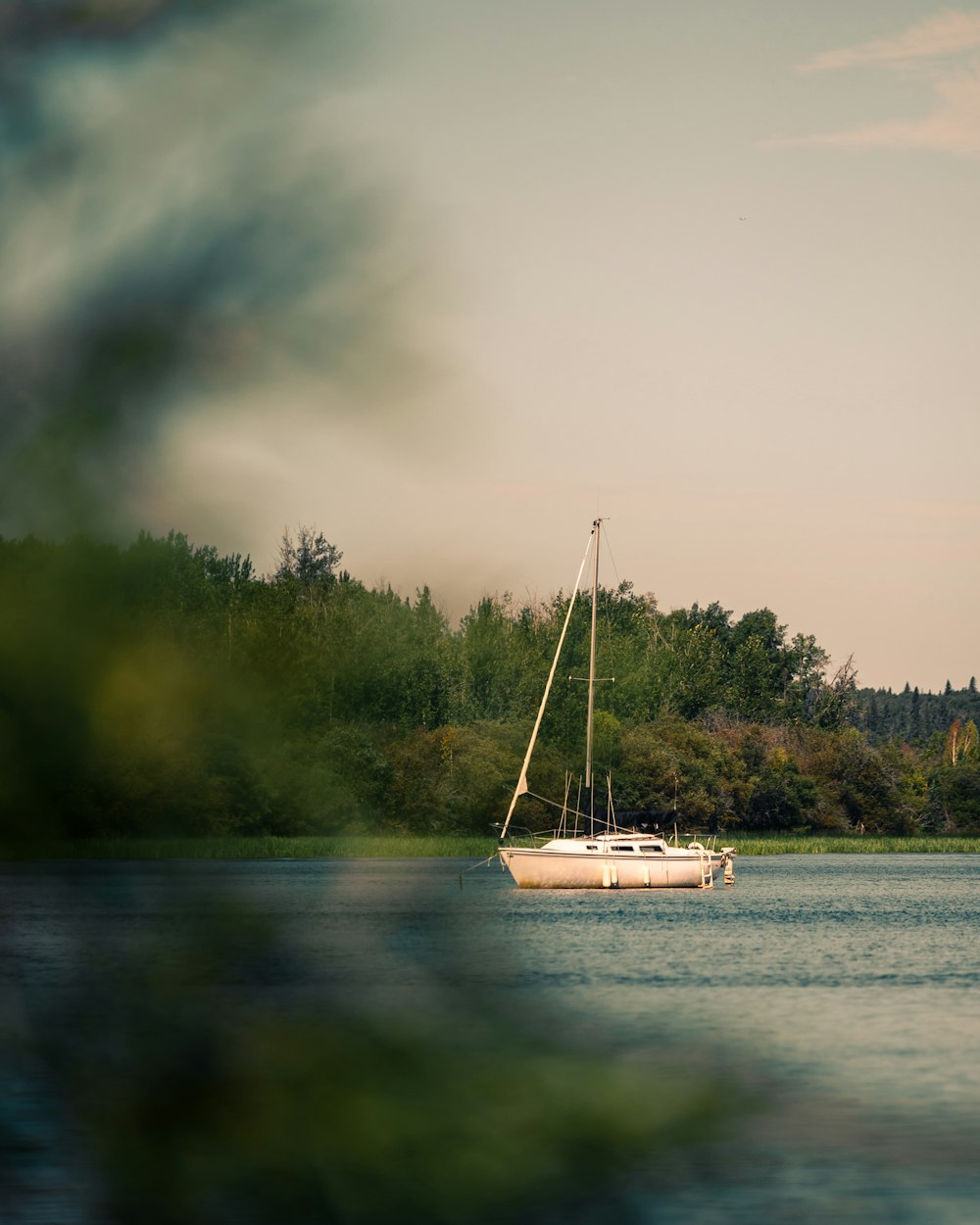 white ship on body of water