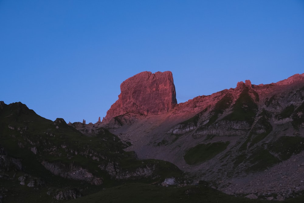 rocky valley under blue sky