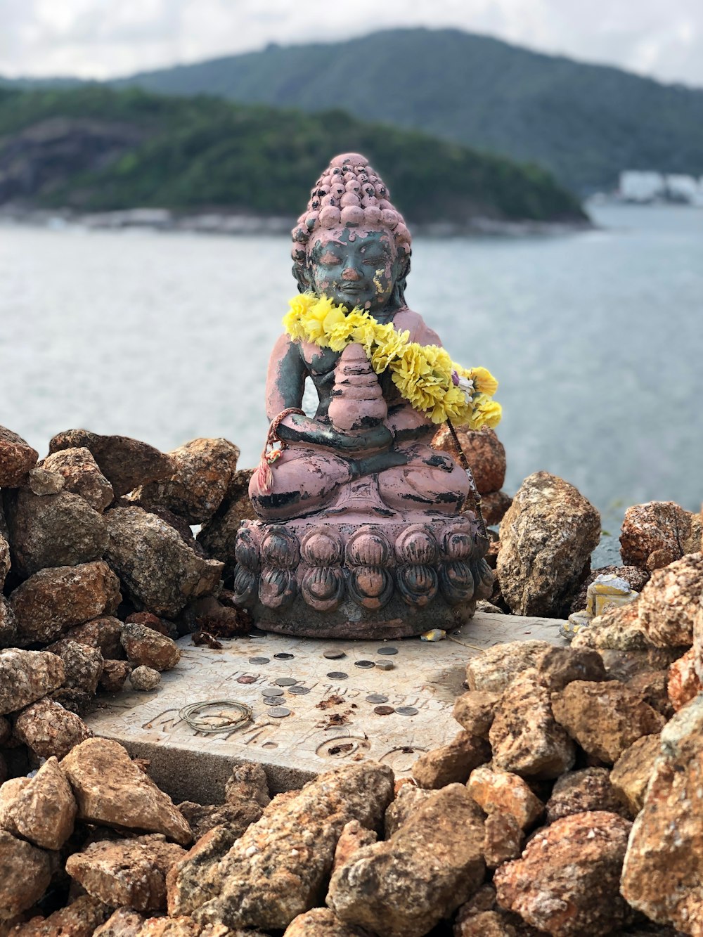 shallow focus photo of Gautama Buddha fiurine